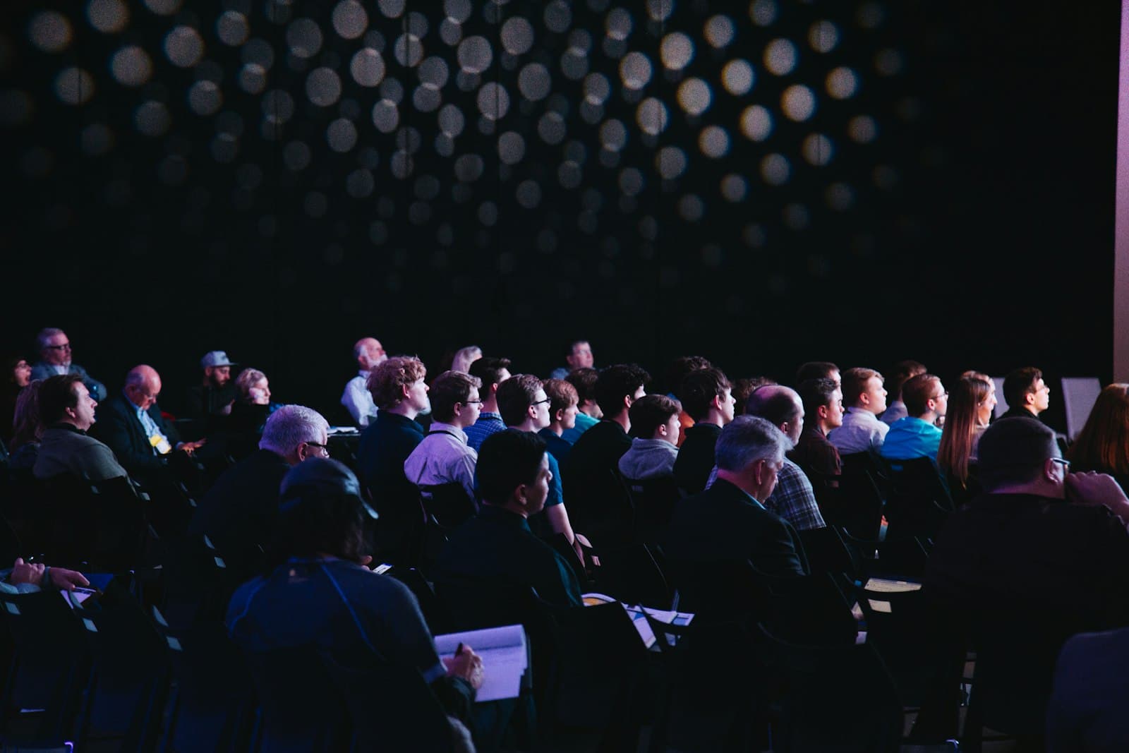 Audience seated in a conference hall